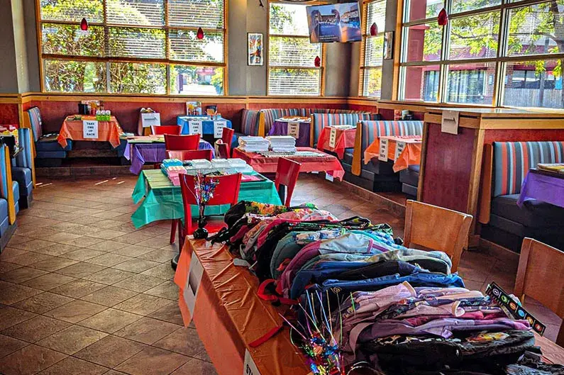 Filling Backpacks at Red Robin